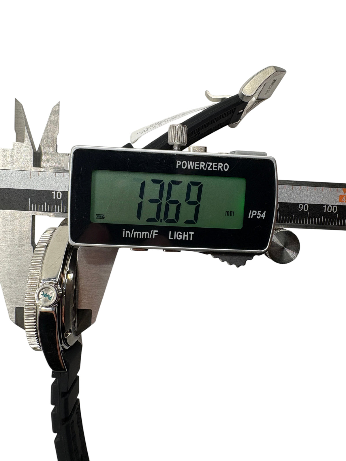 CURATED by Kira Michael Kors Maritime watch case thickness being measured by digital calipers
