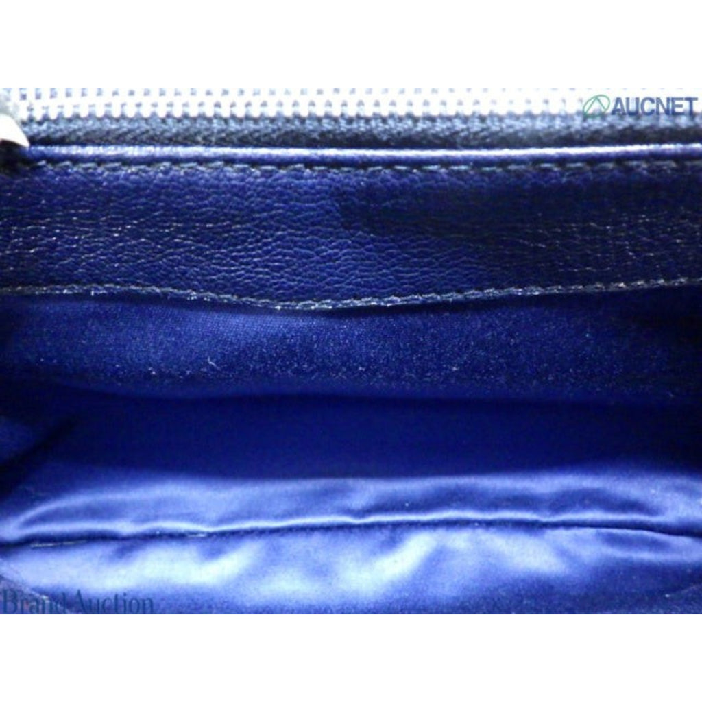Interior view of CURATED by Kira Miu Miu navy blue denim Matelassé bag with smooth fabric lining