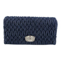CURATED by Kira Miu Miu navy denim matelassé bag with silver bijou turn lock hardware