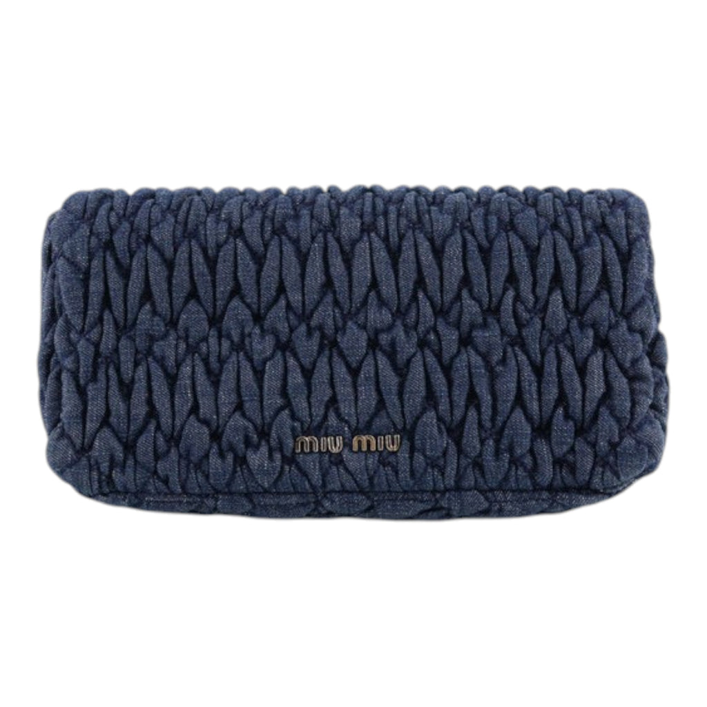 CURATED by Kira Miu Miu navy denim matelassé clutch bag with silver hardware and front logo detail