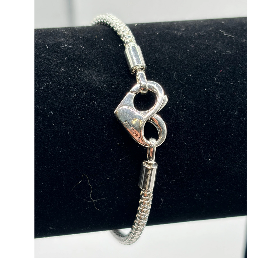 CURATED by Kira Pandora sterling silver bracelet featuring a heart-shaped clasp and textured mesh chain design.