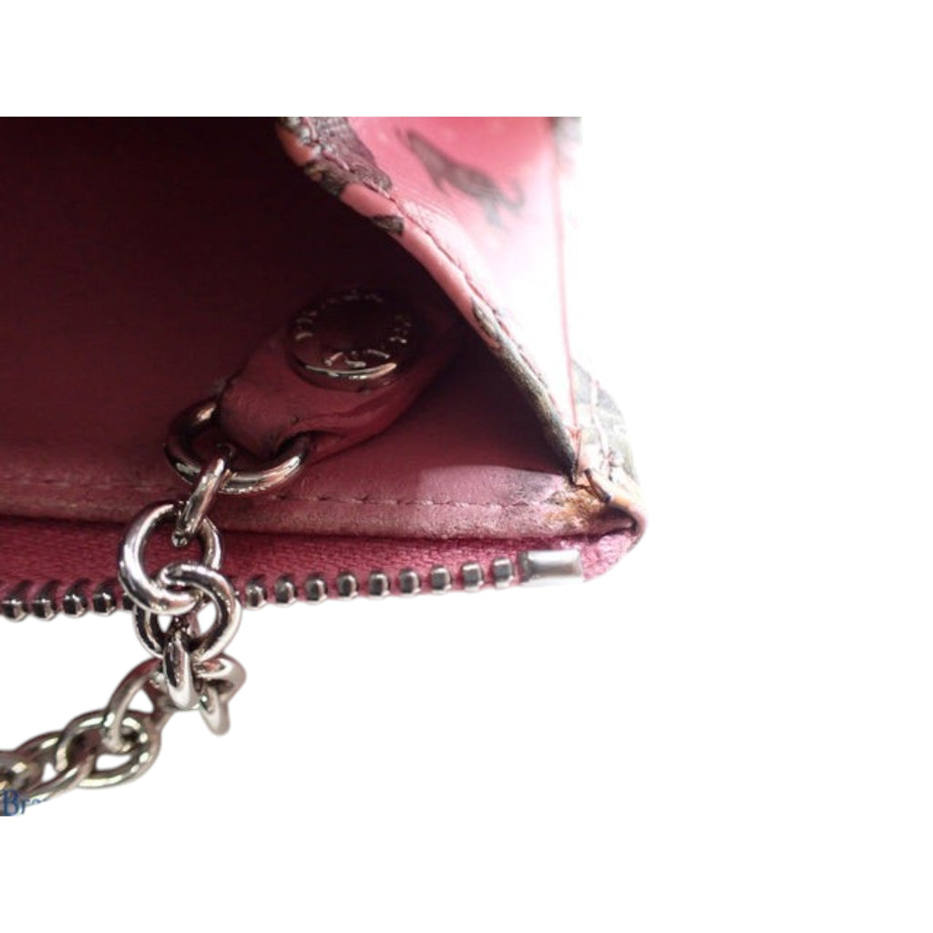 CURATED by Kira pink Prada coin case featuring a silver keyring chain and interior logo hardware detail
