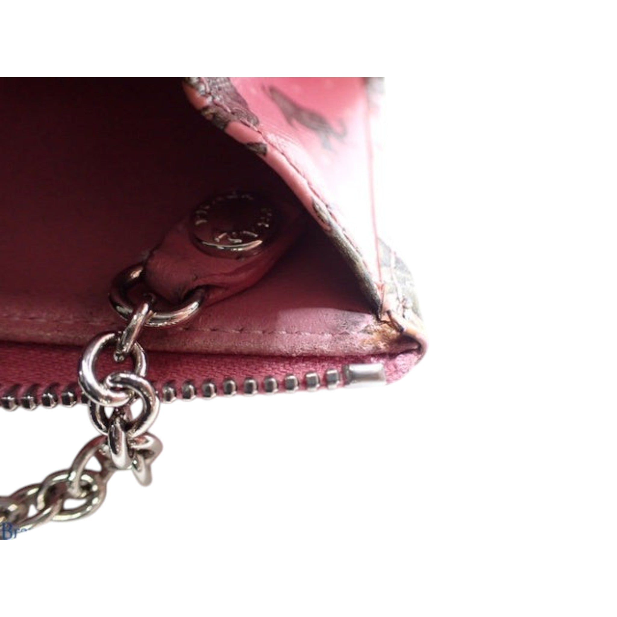 CURATED by Kira pink Prada coin case featuring a silver keyring chain and interior logo hardware detail