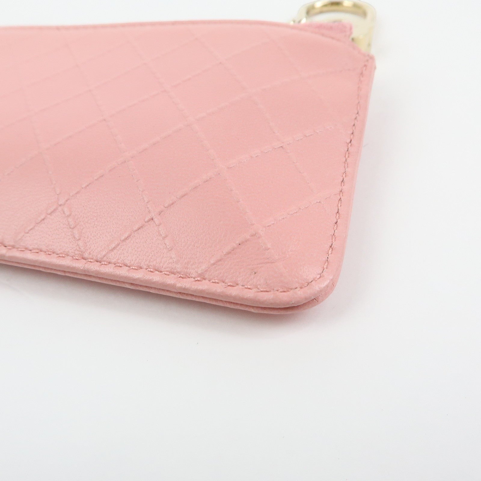 CURATED by Kira pink quilted leather zip around card holder with floral charm detail