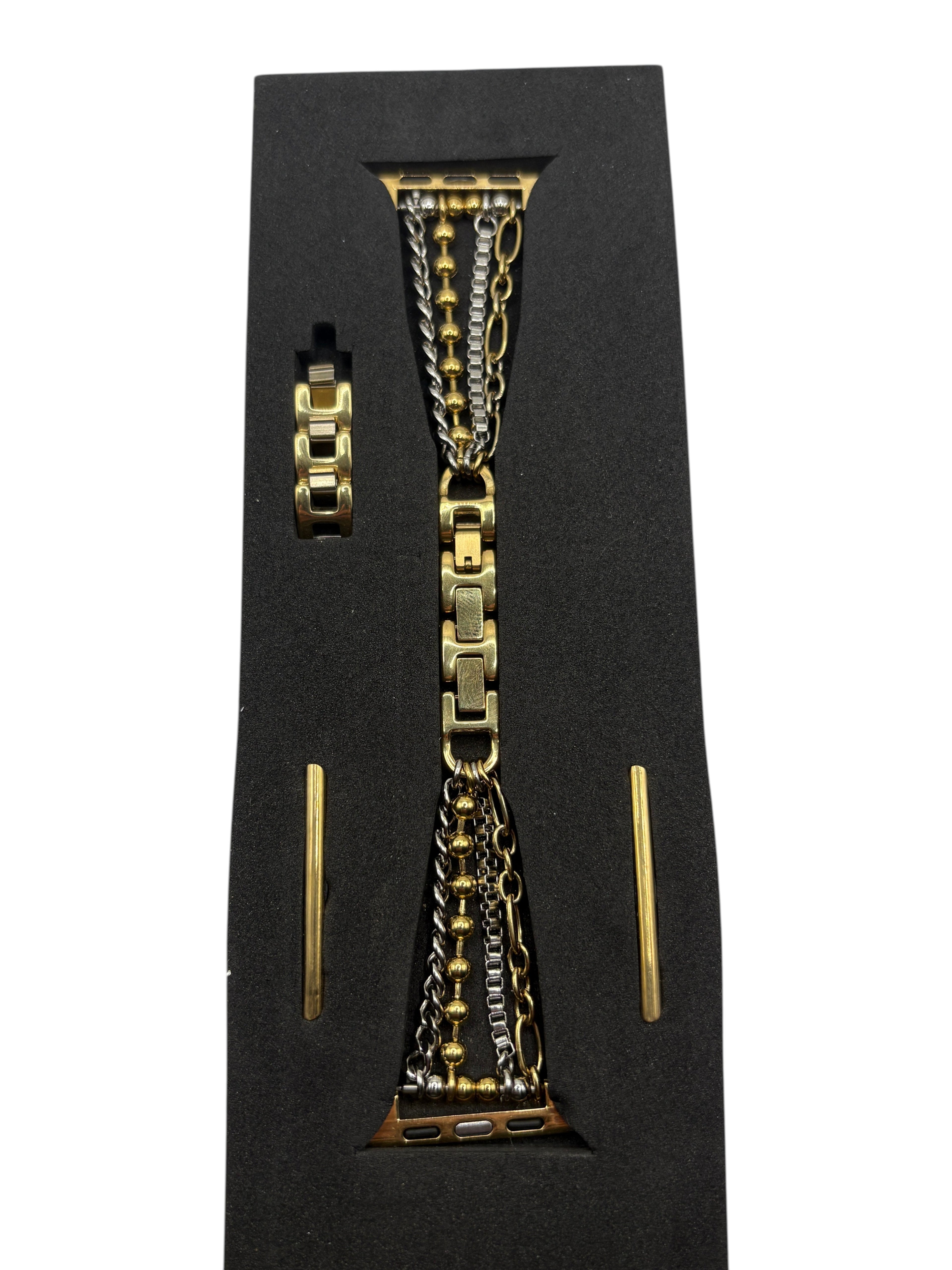 CURATED by Kira PoshTech mixed gold and silver layered chain Apple Watch band in black display packaging