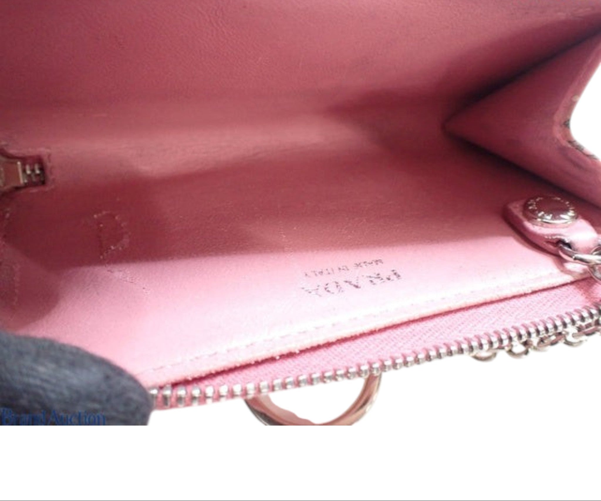 CURATED by Kira pink Prada coin case interior with keyring chain and embossed logo in very good condition