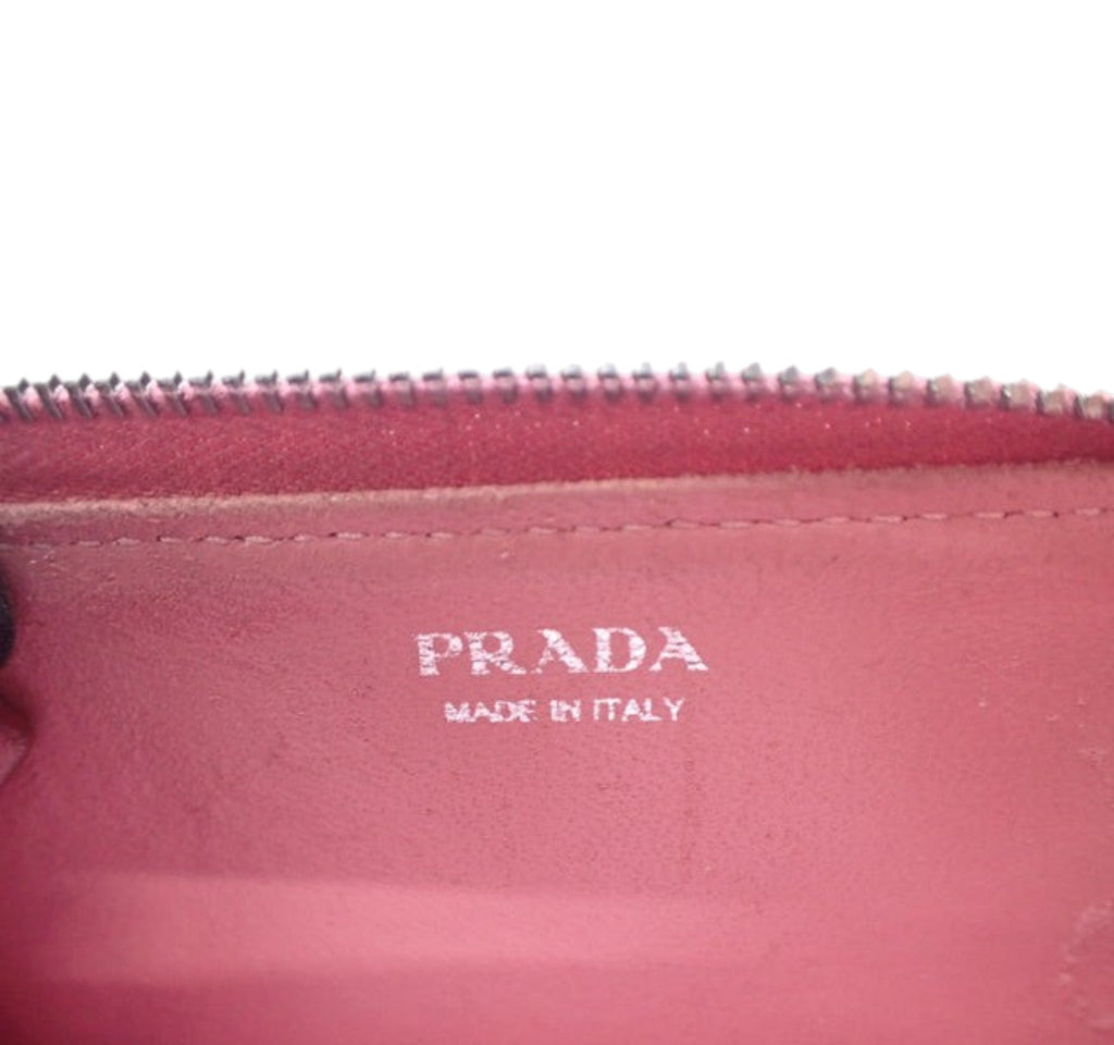 CURATED by Kira Prada pink leather coin case interior with silver Prada Made in Italy logo stamp