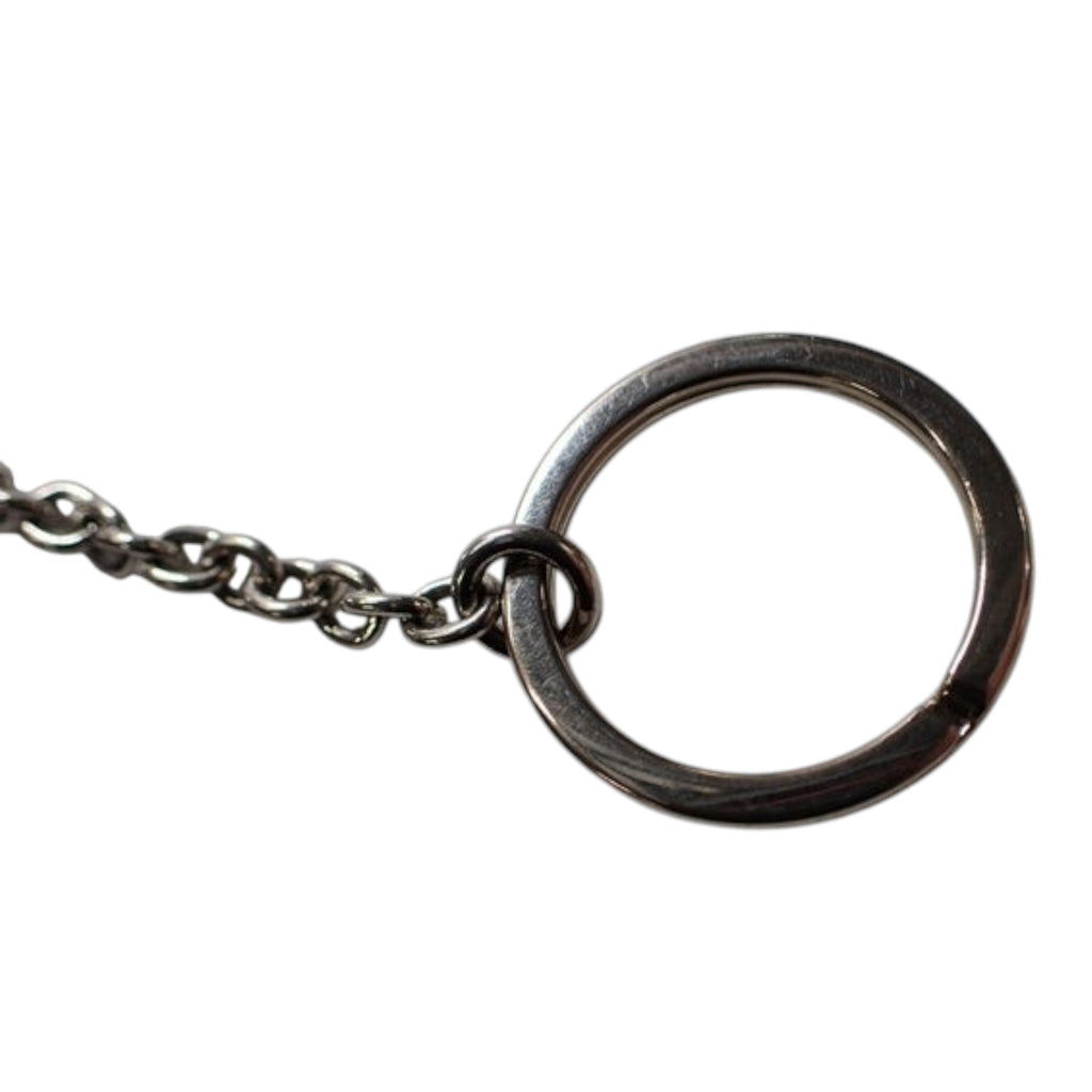 CURATED by Kira Prada pink coin case silver metal keyring chain attachment