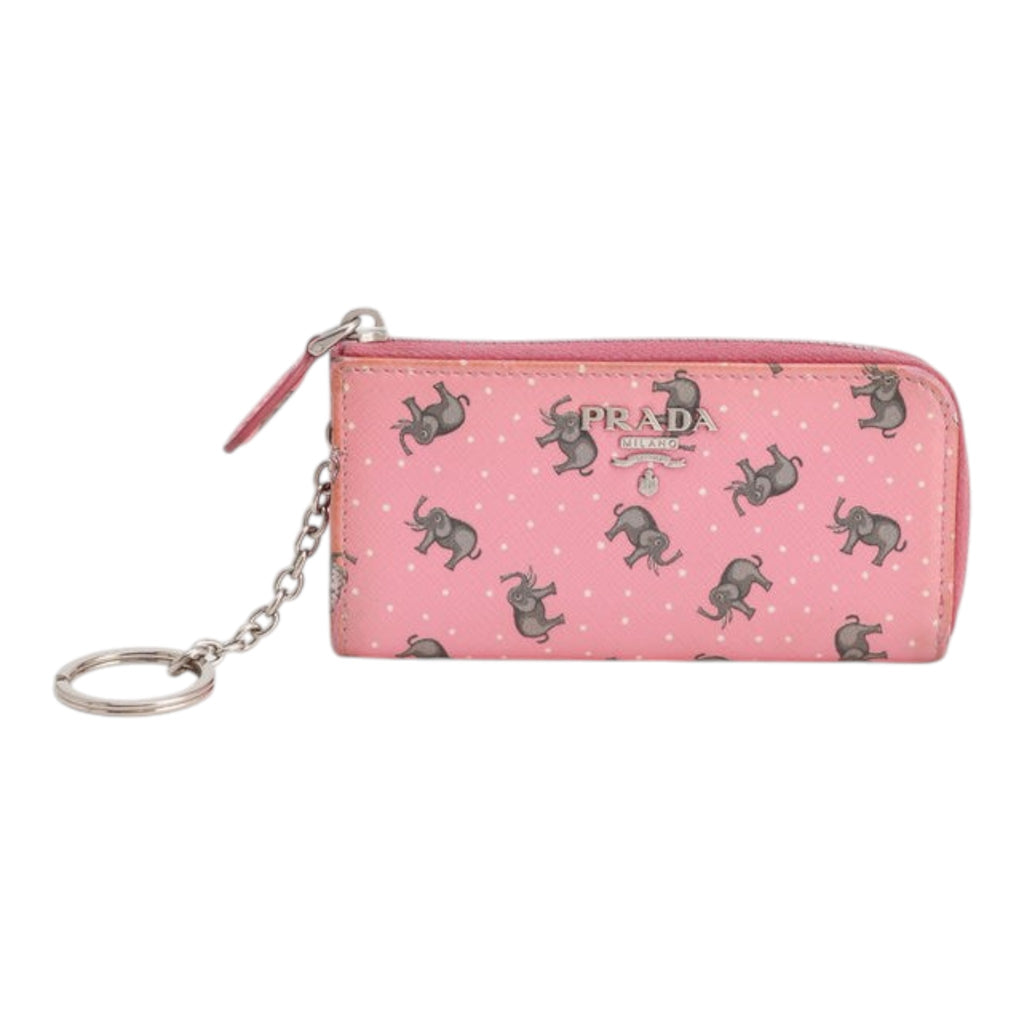 CURATED by Kira pink Prada coin case featuring a playful elephant and polka dot print with a silver keyring chain.
