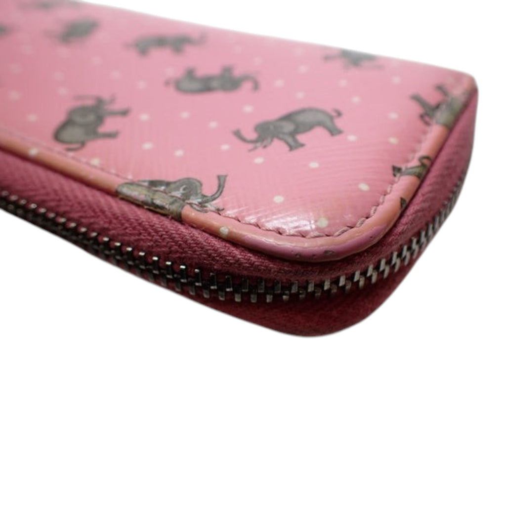 CURATED by Kira pink Prada coin case featuring a grey elephant and white polka dot print with a zip closure