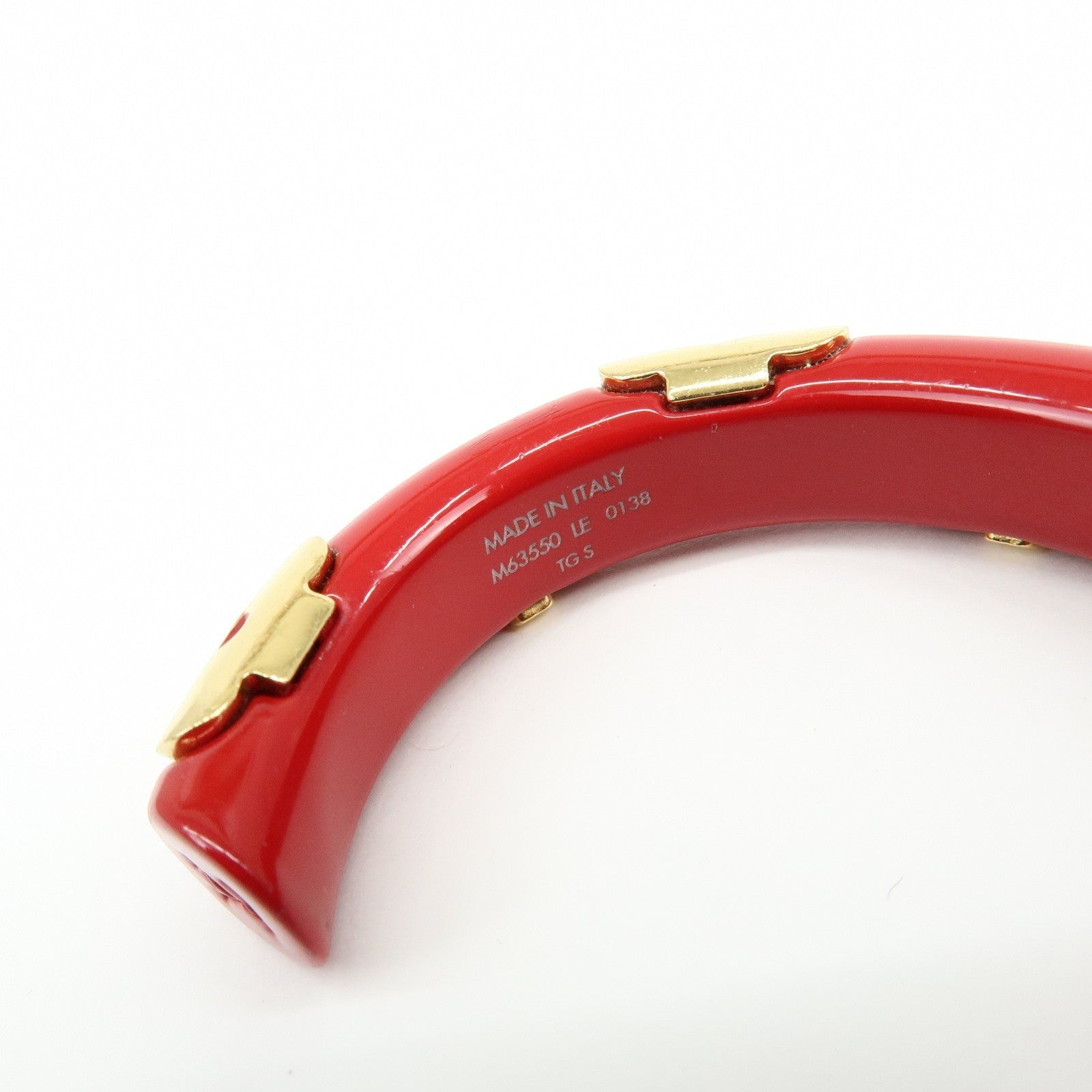 CURATED by Kira red ceramic and gold-tone metal Louis Vuitton Paris bangle bracelet with engraved details