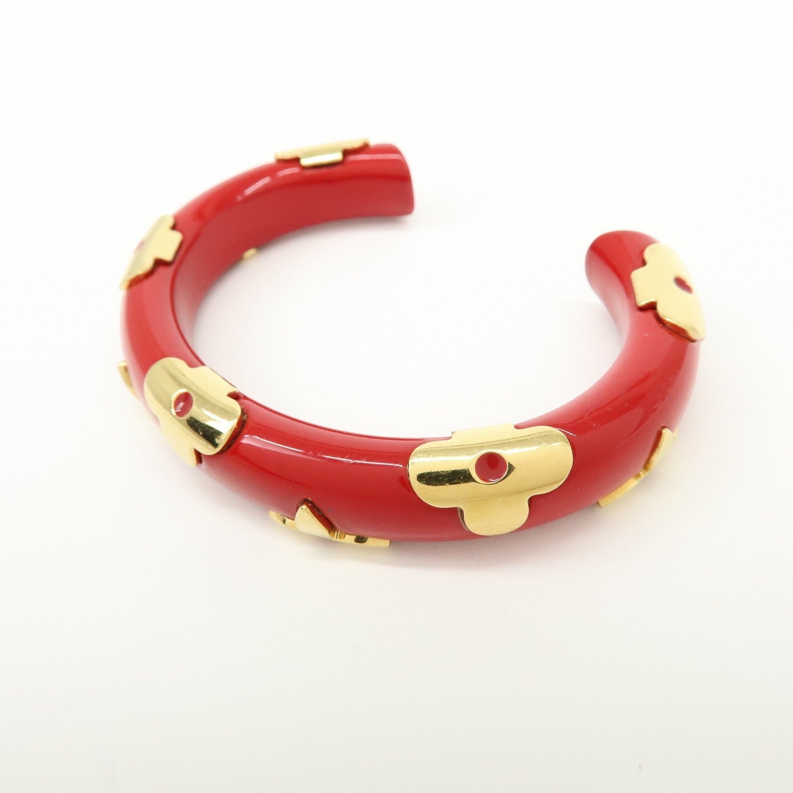 CURATED by Kira red ceramic and gold-tone metal Louis Vuitton Paris bangle bracelet with floral accents