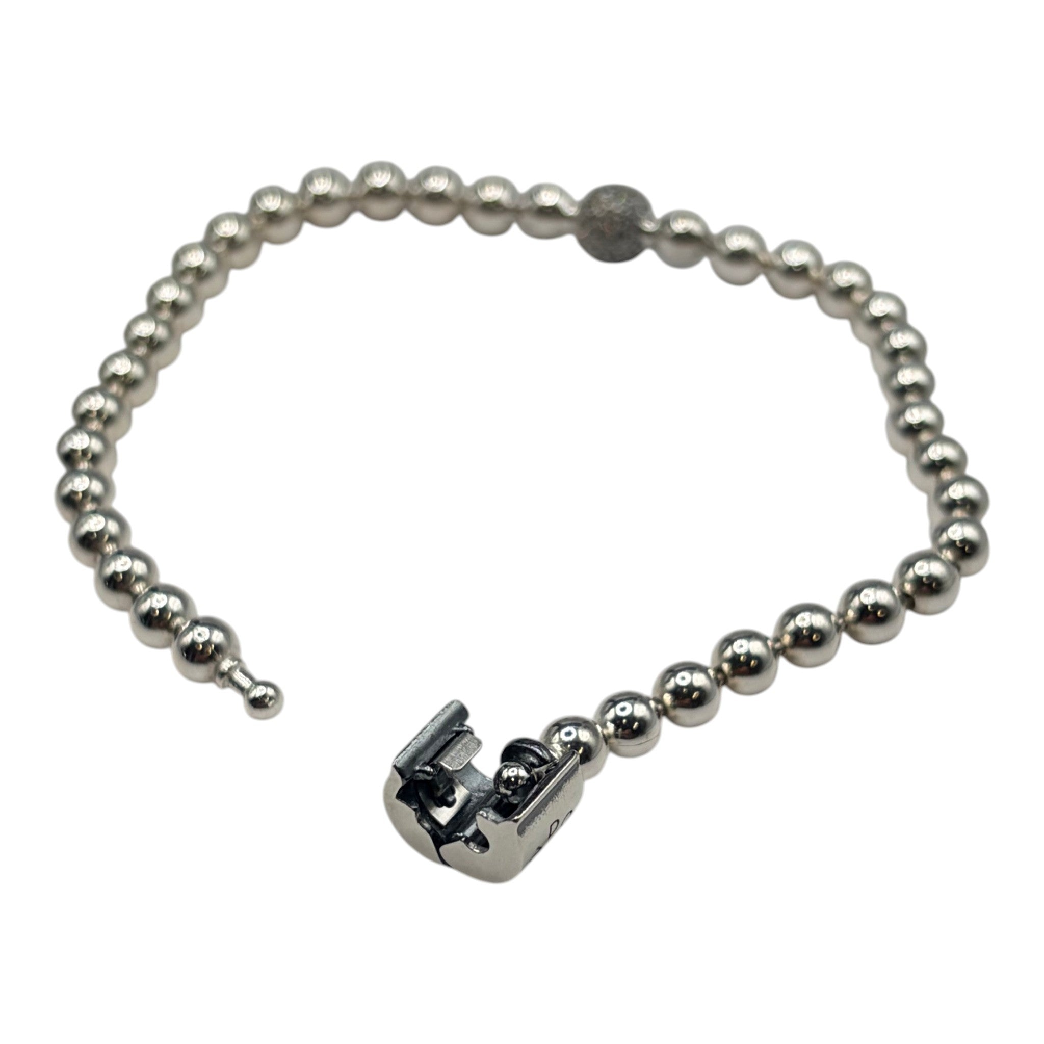 CURATED by Kira Pandora silver tone beaded bracelet featuring a pave crystal ball accent and a secure clasp closure.