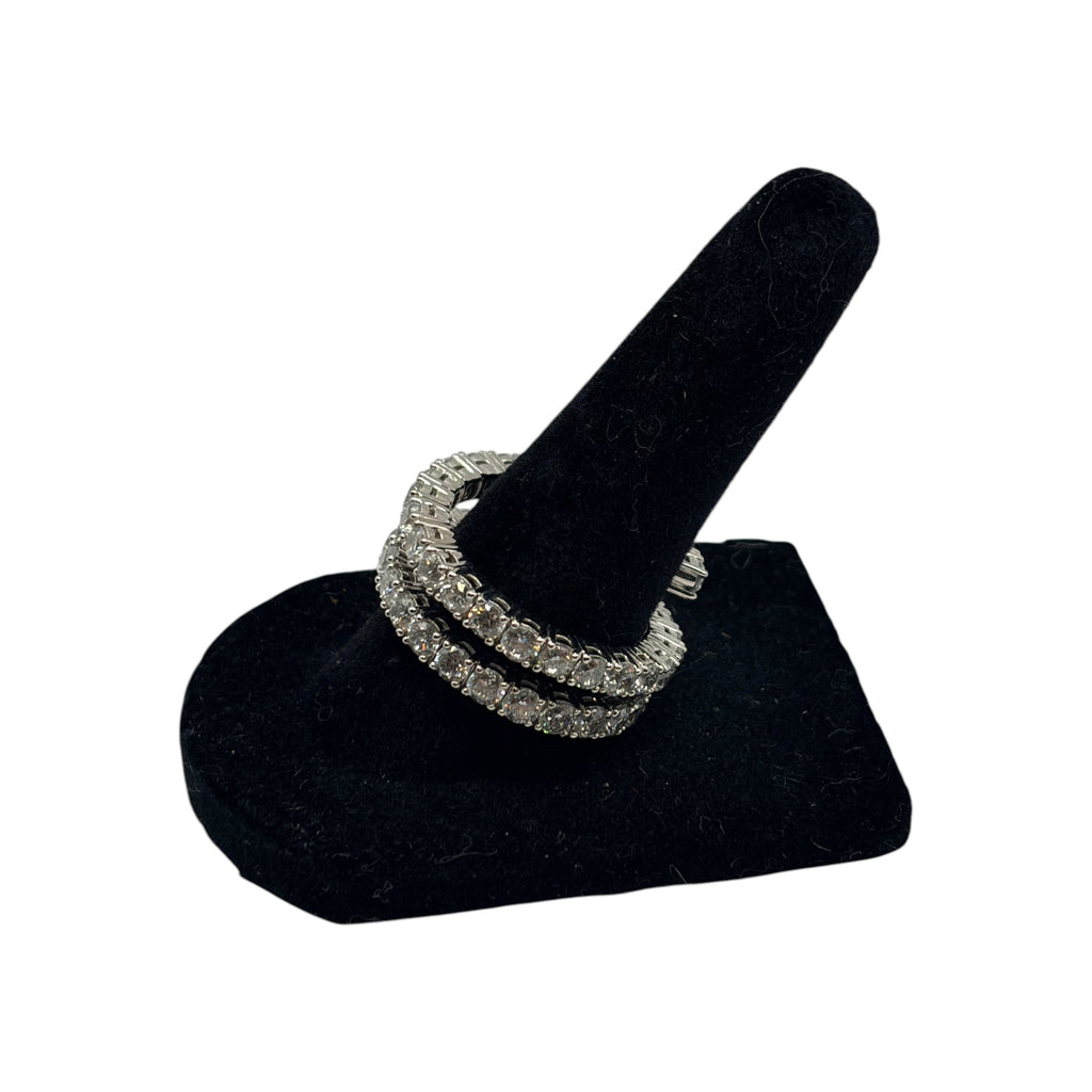CURATED by Kira silver tone double row eternity band ring featuring sparkling cubic zirconia stones on black display
