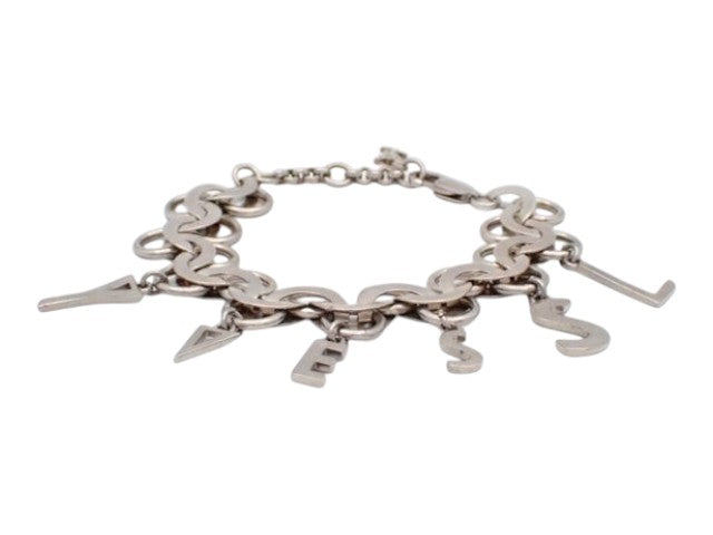 CURATED by Kira silver YSL logo swing bracelet featuring dangling Cassandra letter charms on a circular link chain.