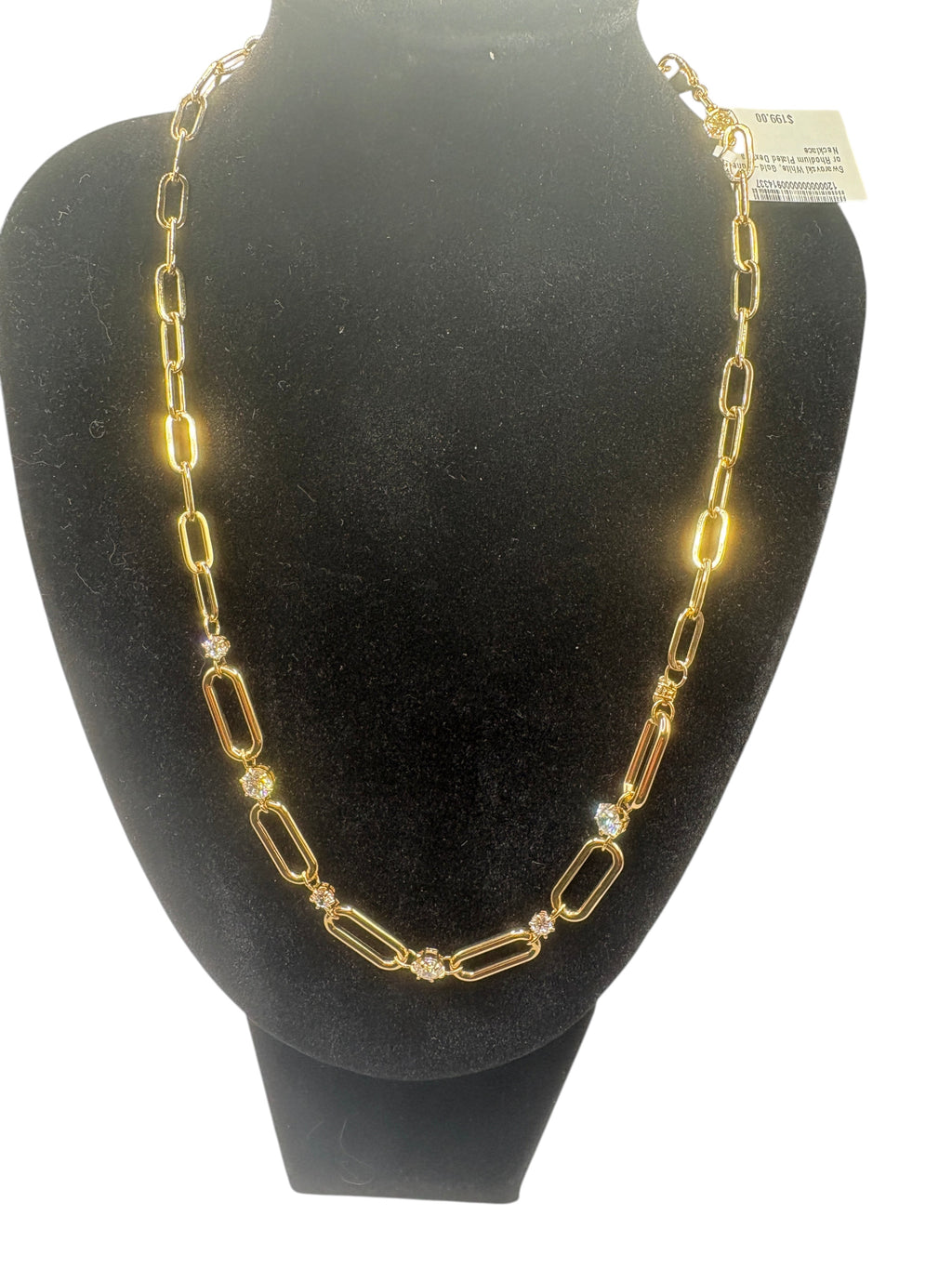 CURATED by Kira Swarovski Dextera gold-tone paperclip chain necklace featuring sparkling white crystal accents.