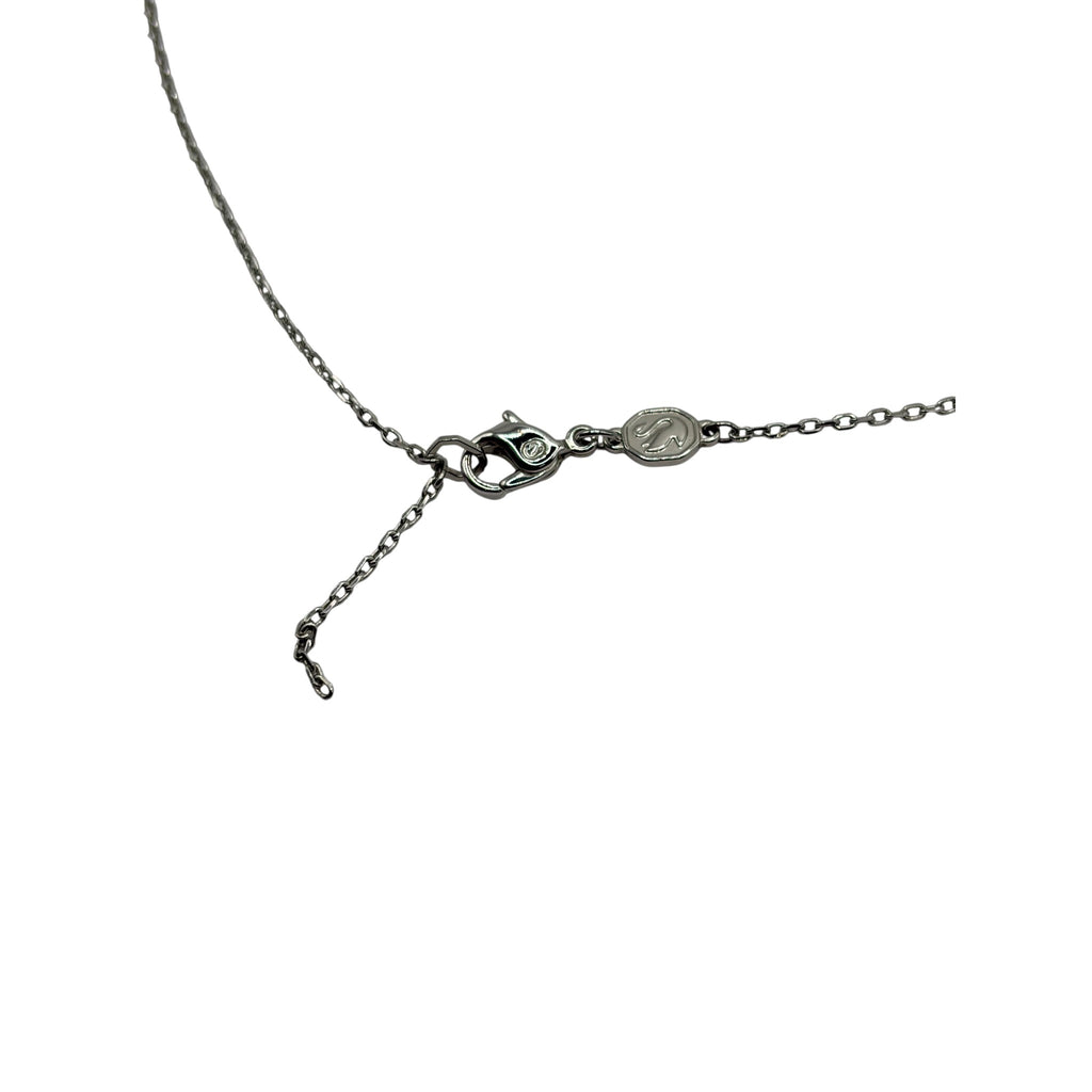 CURATED by Kira Swarovski Mesmera silver-tone necklace clasp and extender chain detail on white background