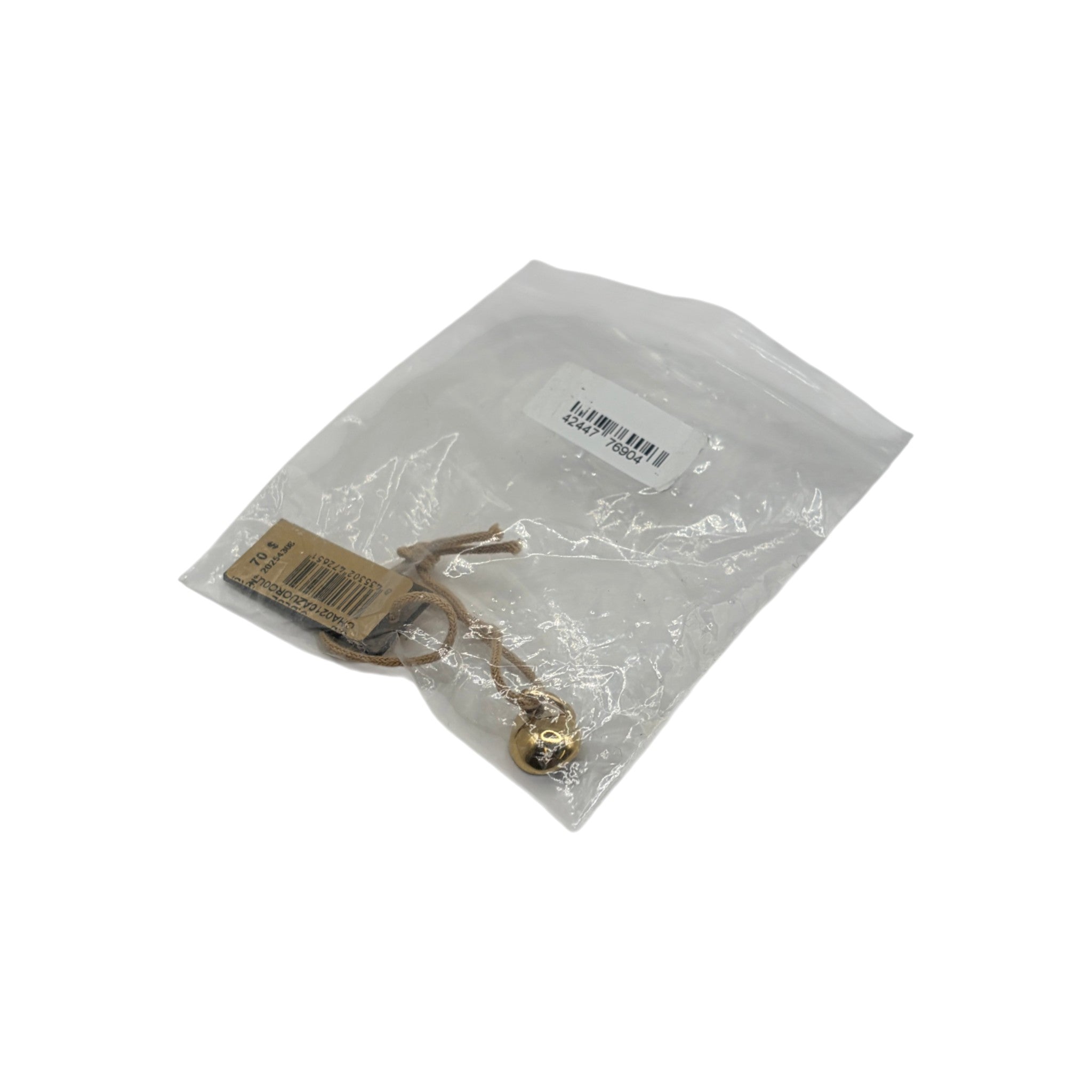 CURATED by Kira Uno de 50 gold tone ball charm in original plastic packaging with attached price tag