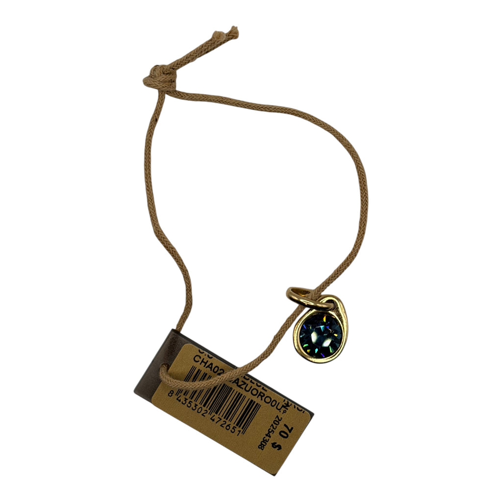 CURATED by Kira Uno de 50 gold tone charm with a faceted green crystal drop on a brown cord with original price tag