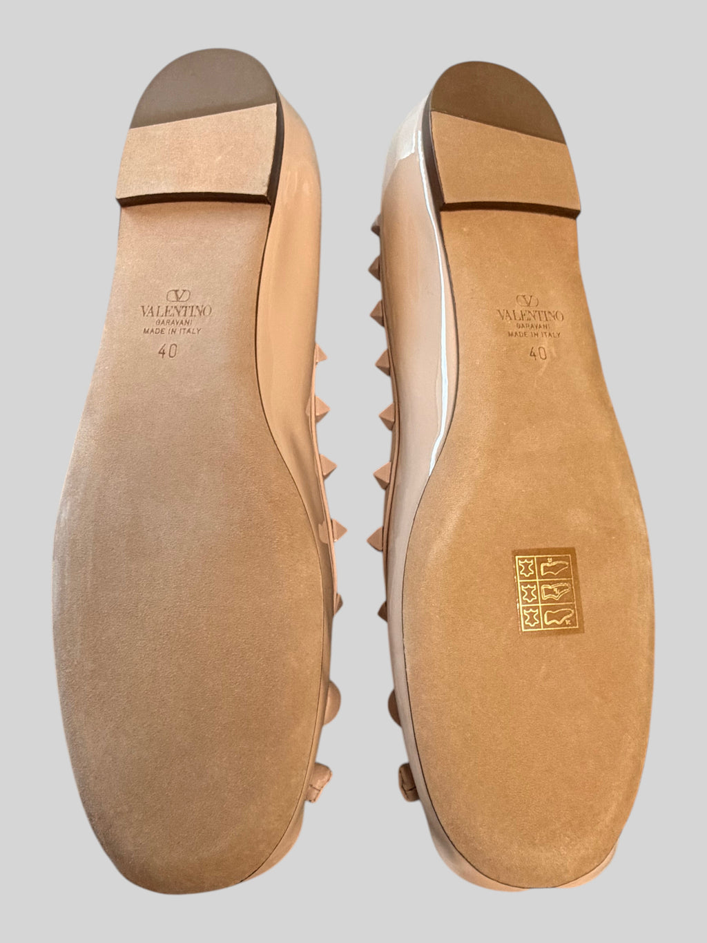 CURATED by Kira Valentino Garavani Rockstud ballerina flats in rose quartz patent leather, showing the soles, size 40.