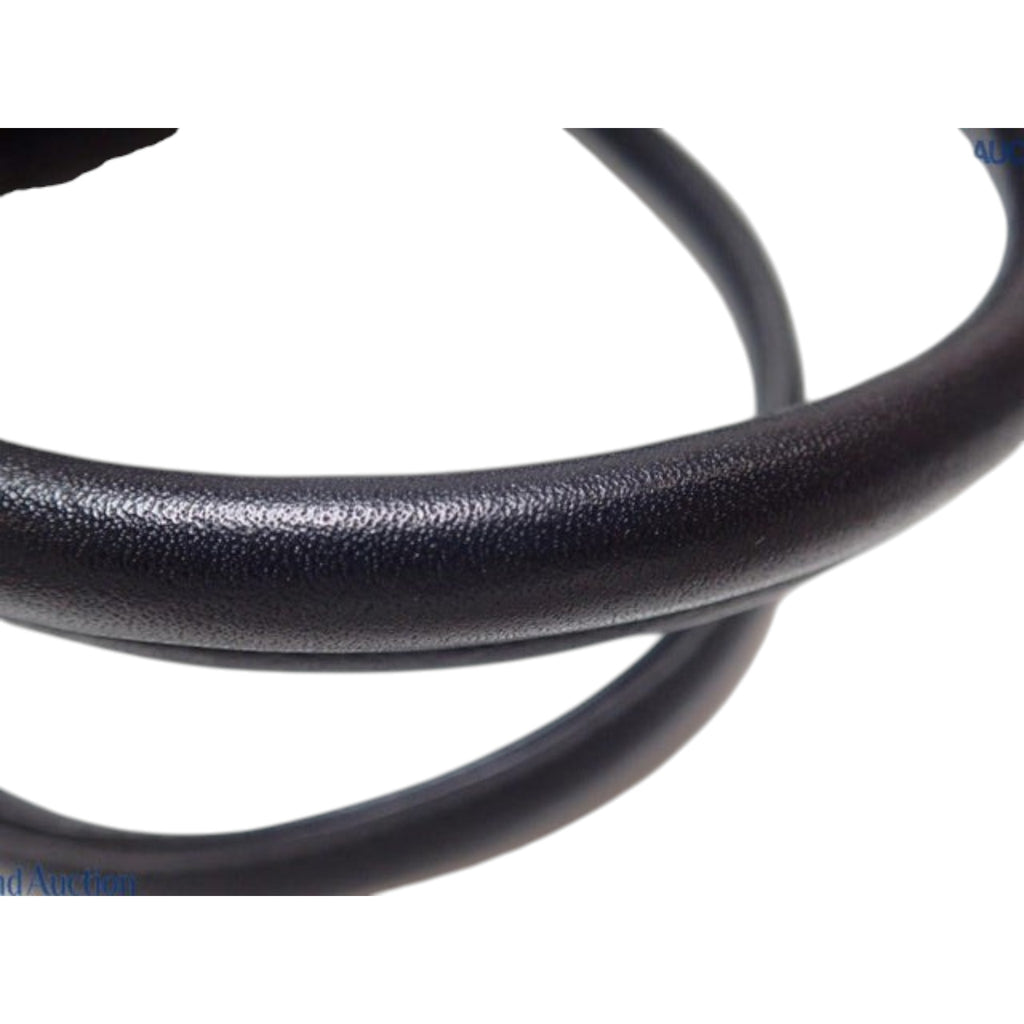 CURATED by Kira Vivienne Westwood black enamel handbag handle detail showing textured finish