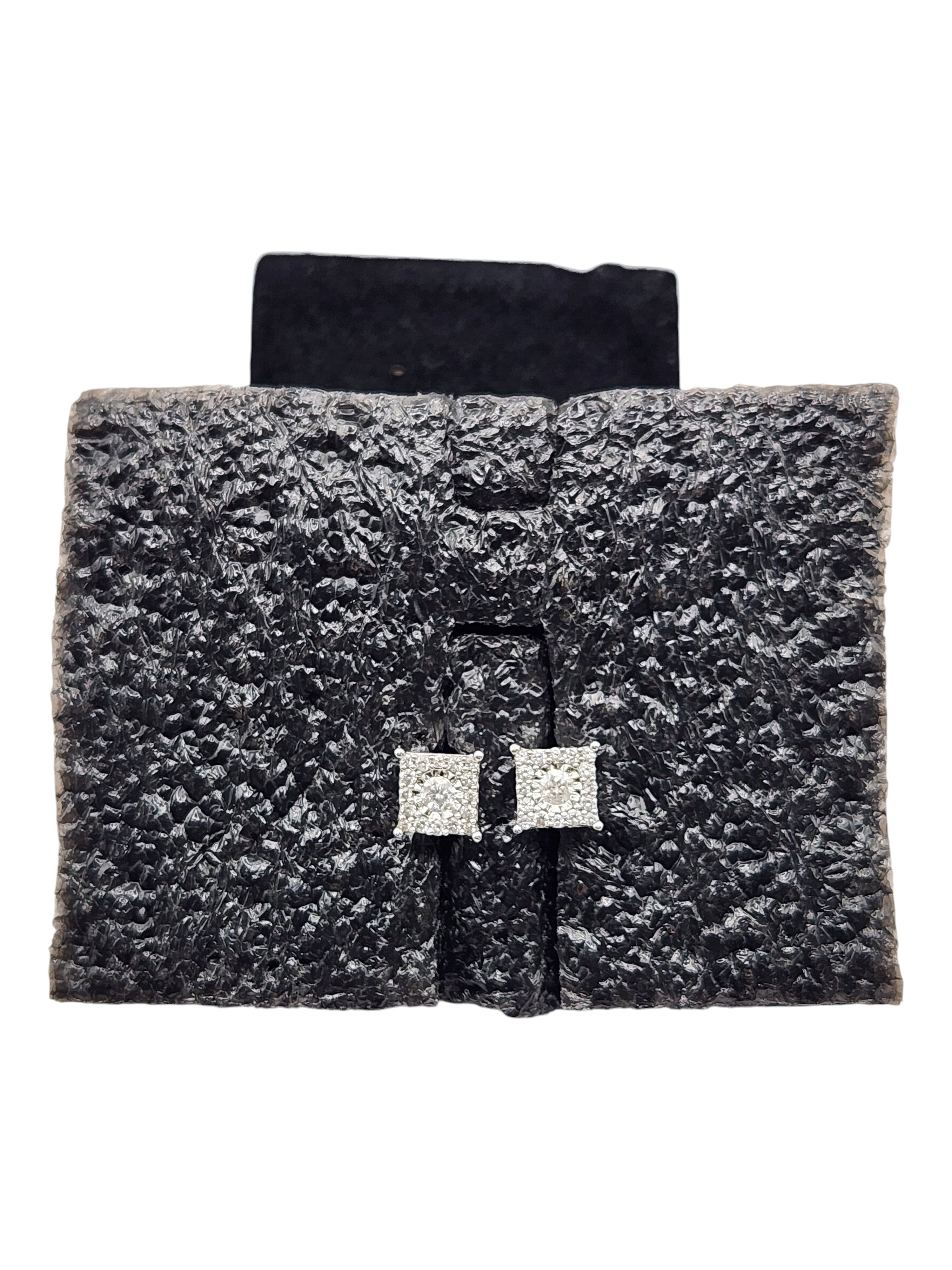 CURATED by Kira 14K white gold square halo diamond stud earrings with 1/3 CTTW, displayed on a black velvet stand.
