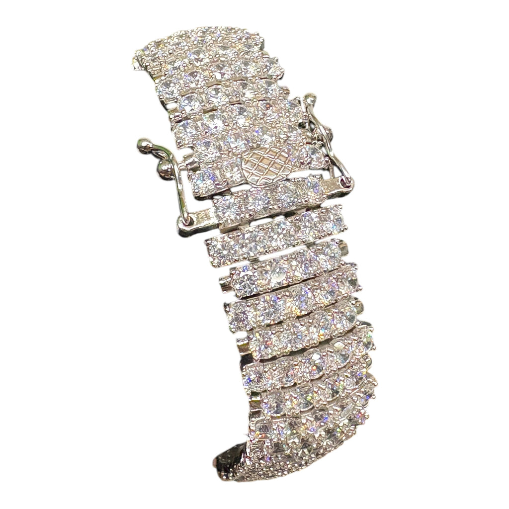CURATED by Kira wide 5-row sterling silver tennis bracelet featuring sparkling round-cut cubic zirconia stones.