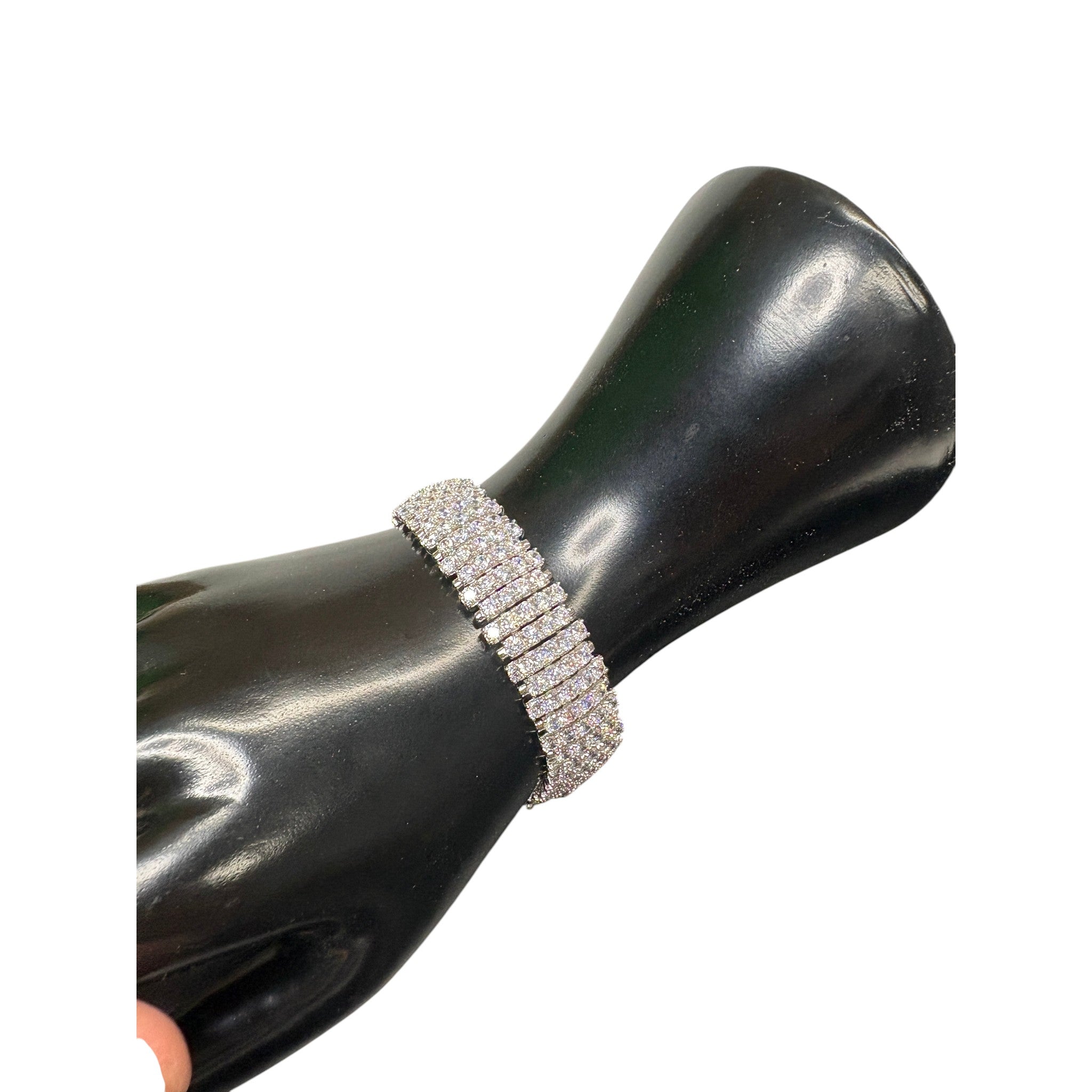 CURATED by Kira wide 5-row sterling silver tennis bracelet featuring sparkling round-cut cubic zirconia stones.