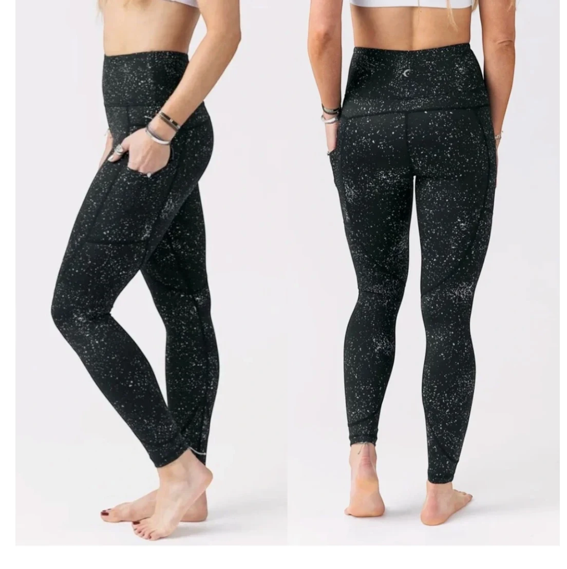CURATED by Kira Zyia Active black high-rise leggings with reflective silver splatter pattern and side pockets.