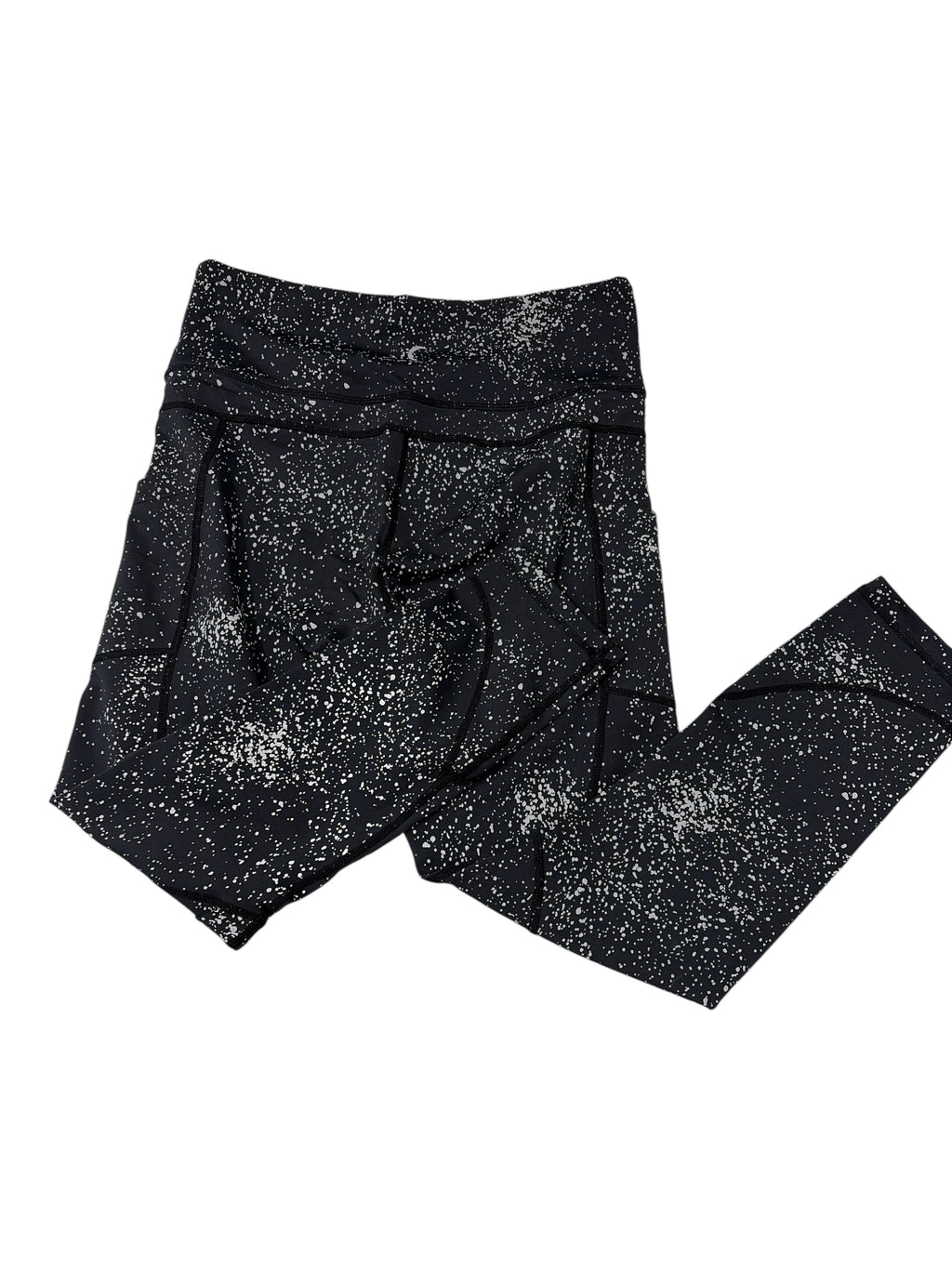 CURATED by Kira Zyia Active black high-rise leggings with silver reflective paint splatter and side pockets.