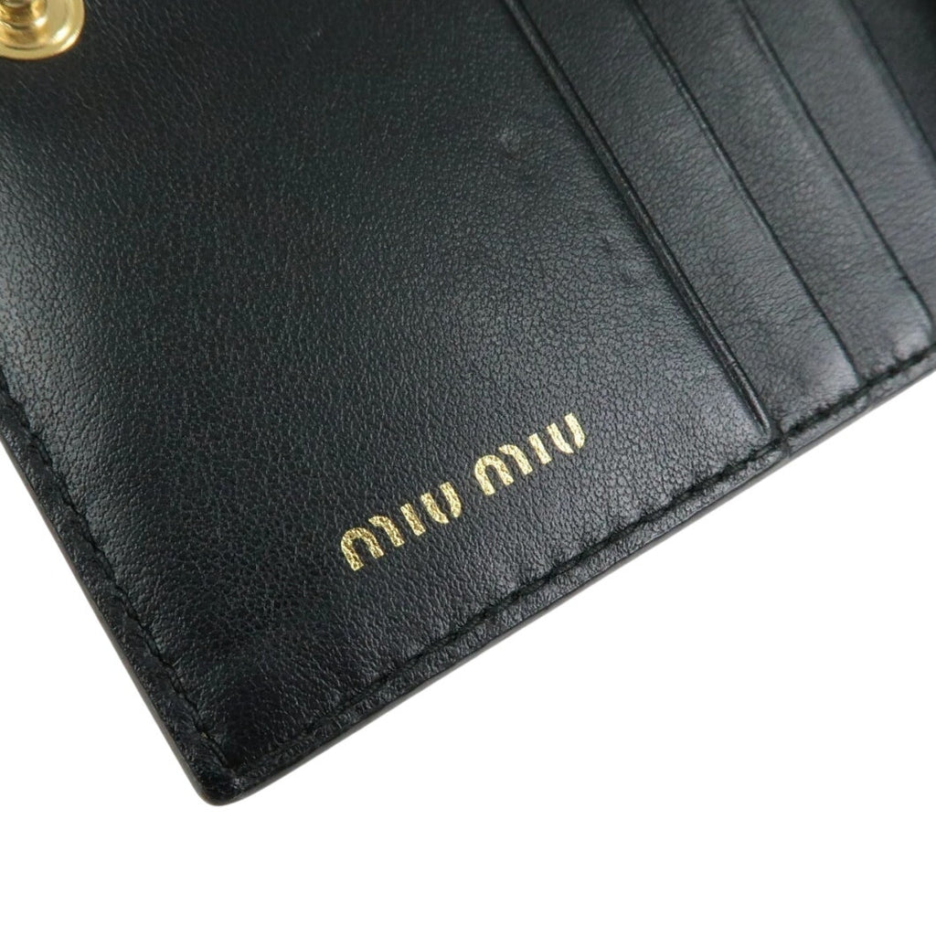 MIU MIU embossed patent leather bi-fold compact wallet