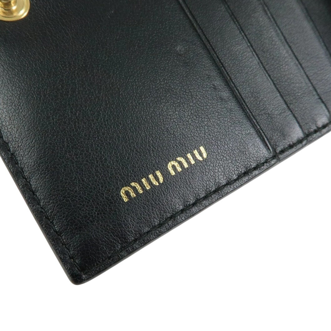 MIU MIU embossed patent leather bi-fold compact wallet