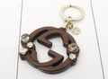 7675 - Gucci GG Interlocking Logo Crystal Keychain - Image 1
