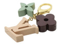 7528 - Louis Vuitton Key Ring Multi Color Resin Flower & LV Logo Charm - Image 1