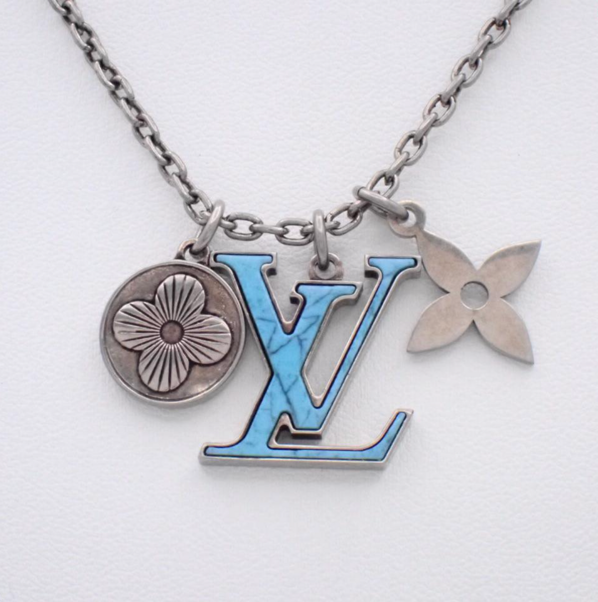 7664 - Louis Vuitton Turquoise LV Initiales Pendant Necklace - Image 1
